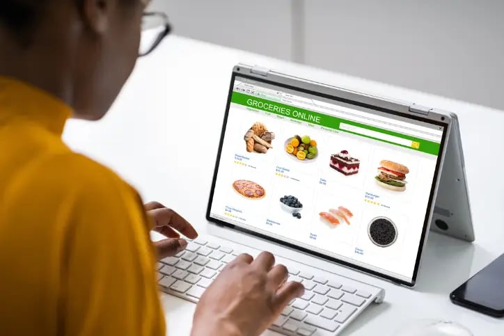 Woman browsing holiday products at a store